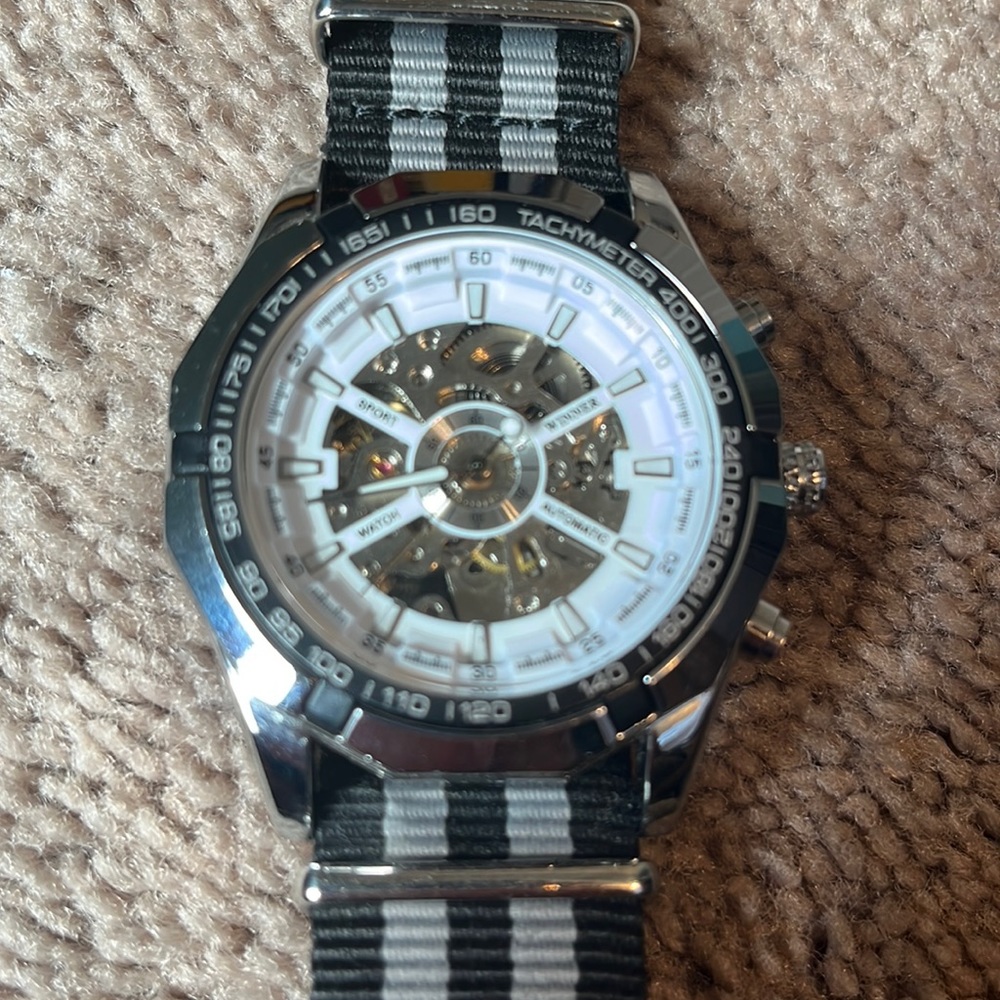 It’s a fngeen luxury mechanical watch